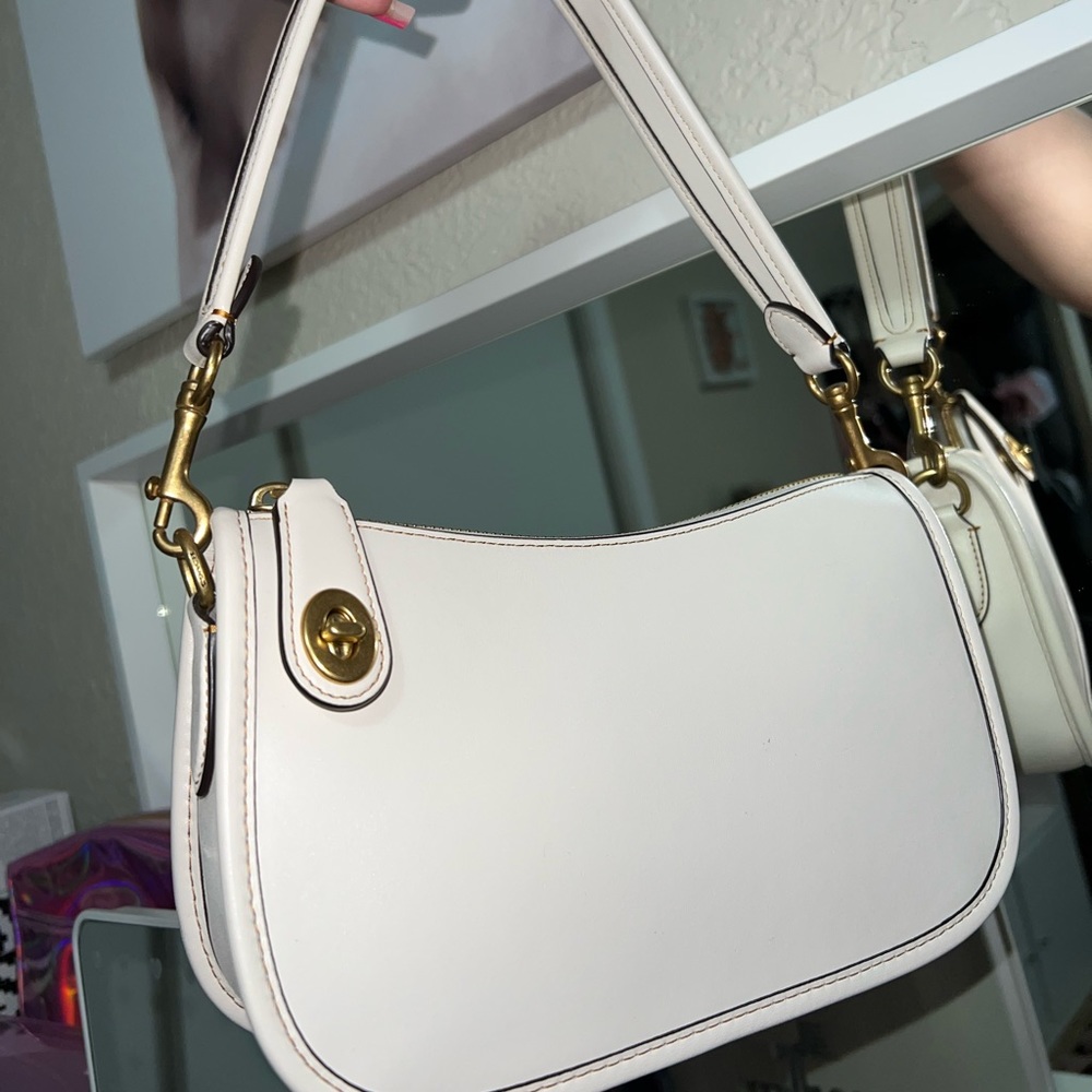 Coach Swinger Bag in Color Chalk Brass.